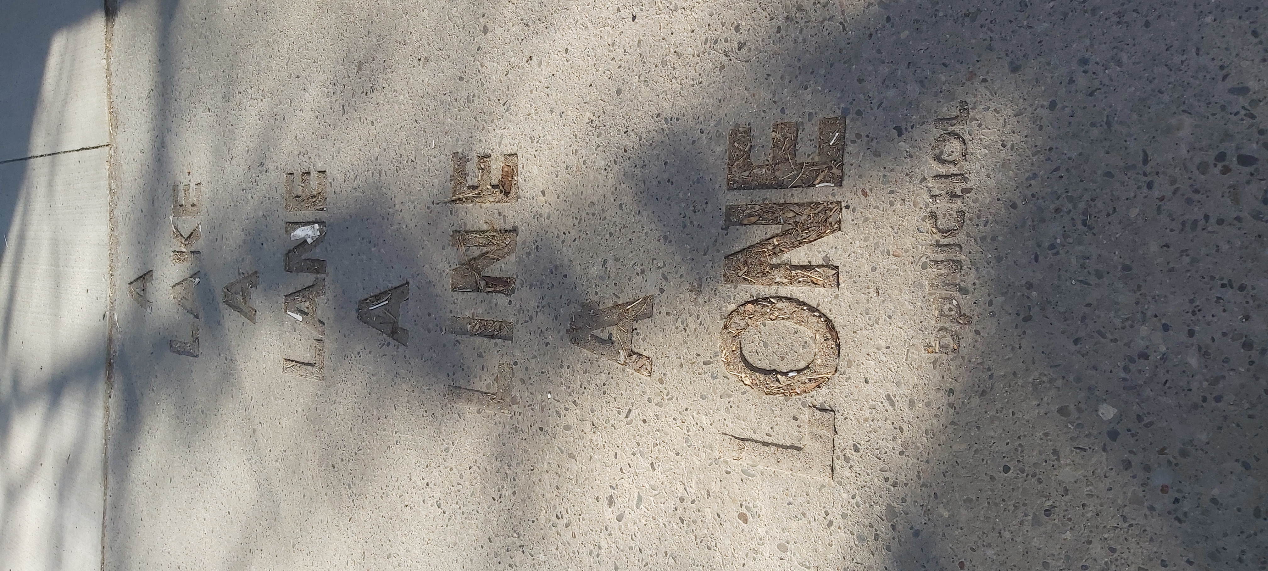 b p Nichol lane poem cut into concrete